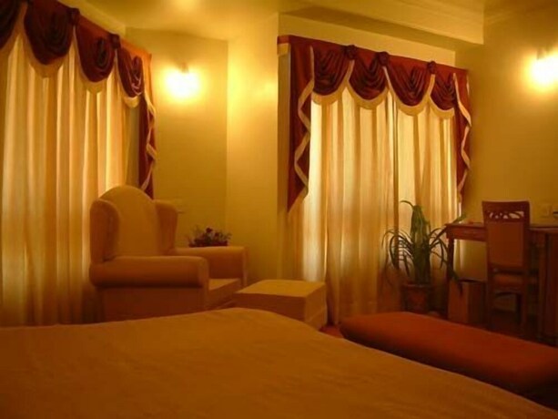 Imagen de la habitación del Hotel Sangat Regency. Foto 26
