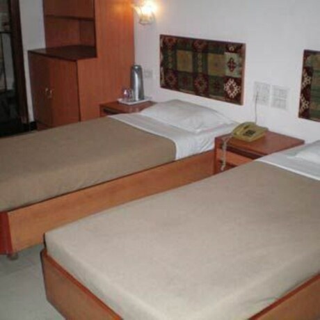 Imagen de la habitación del Hotel Sangat Regency. Foto 38