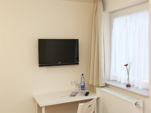 Imagen de la habitación del Hotel Schillerquartier. Foto 9