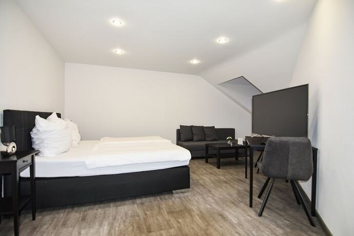 Imagen de la habitación del Hotel Schlemmerscheune. Foto 15