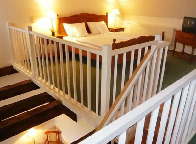 Imagen de la habitación del Hotel Schloss Spyker. Foto 19
