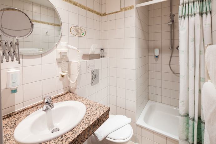 Imagen de la habitación del Hotel Schlossgarten. Foto 9