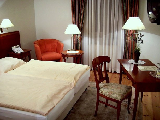 Imagen de la habitación del Hotel Schlossgarten. Foto 10