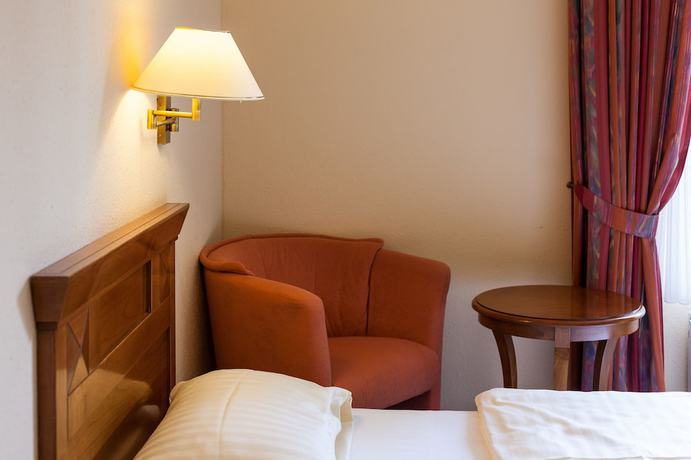 Imagen de la habitación del Hotel Schlossgarten. Foto 11