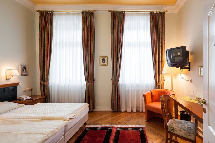 Imagen de la habitación del Hotel Schlossgarten. Foto 13