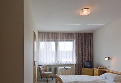 Imagen de la habitación del Hotel Sch&uuml;tz. Foto 9