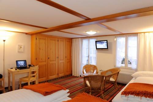 Imagen de la habitación del Hotel Schützen Lauterbrunnen. Foto 6