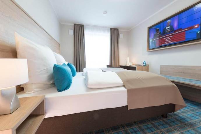 Imagen de la habitación del Hotel Schwarzer Adler. Foto 14