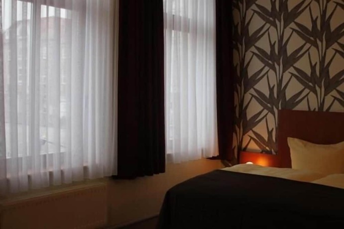 Imagen de la habitación del Hotel Schwarzer Adler. Foto 16