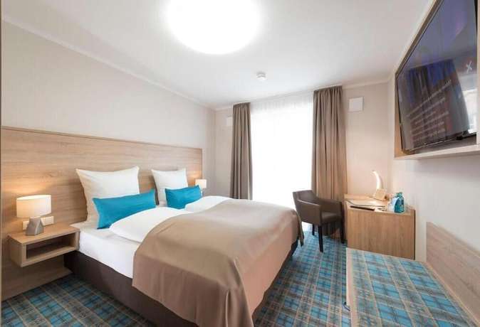 Imagen de la habitación del Hotel Schwarzer Adler. Foto 19