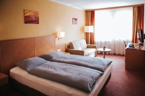 Imagen de la habitación del Hotel Schwertfirm. Foto 9