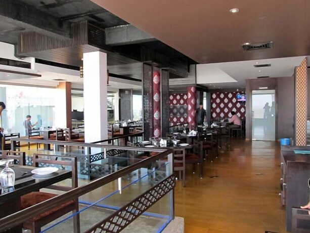 Imagen del bar/restaurante del Hotel Sea Rock Villa. Foto 5