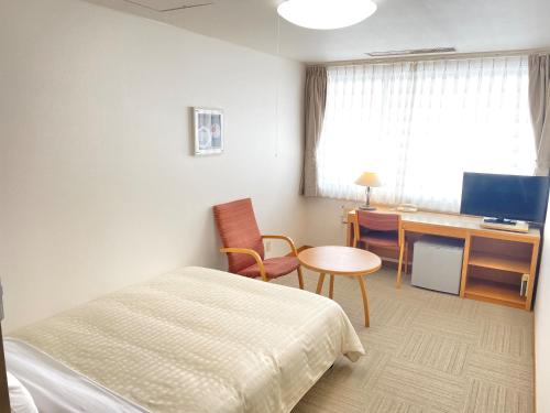Imagen de la habitación del Hotel Shinanoji. Foto 16