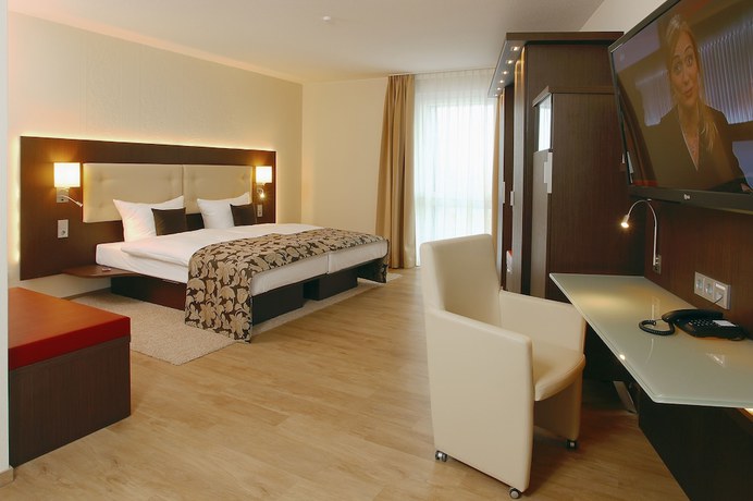 Imagen de la habitación del Hotel Simonshof Wolfsburg. Foto 16