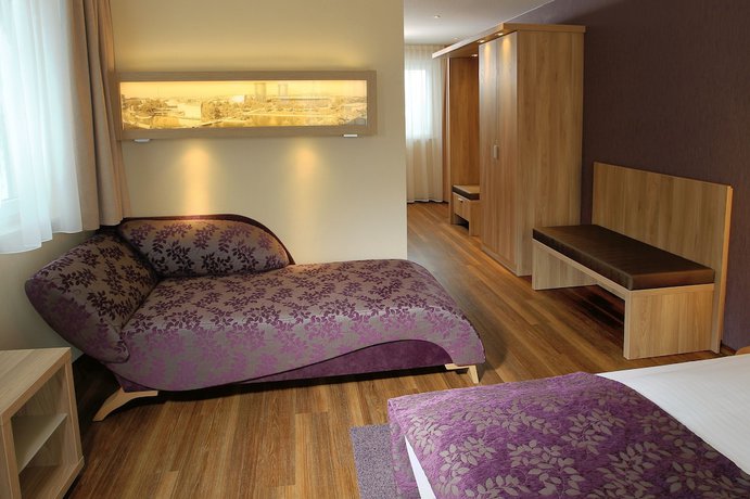 Imagen de la habitación del Hotel Simonshof Wolfsburg. Foto 17