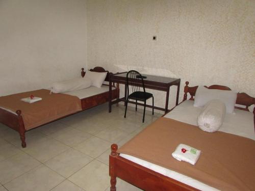 Imagen de la habitación del Hotel Singasari. Foto 17