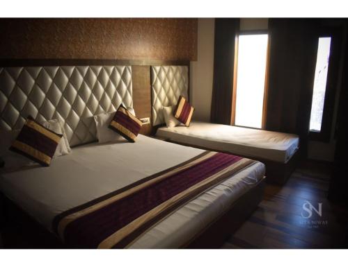 Imagen de la habitación del Hotel Sita Niwas Since 1965, Amritsar. Foto 17