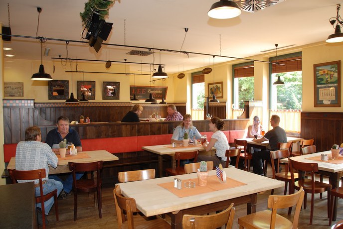 Imagen del bar/restaurante del Hotel Sleepinger. Foto 7