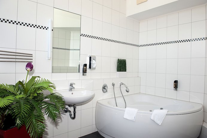 Imagen de la habitación del Hotel Sleepinger. Foto 12