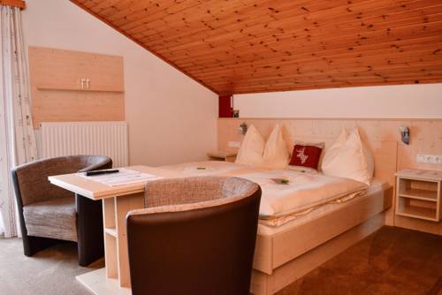 Imagen de la habitación del Hotel Sonnfeld. Foto 6