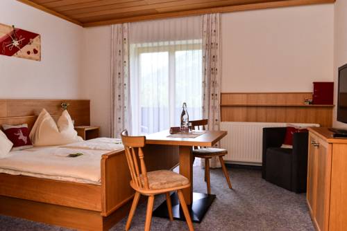 Imagen de la habitación del Hotel Sonnfeld. Foto 7