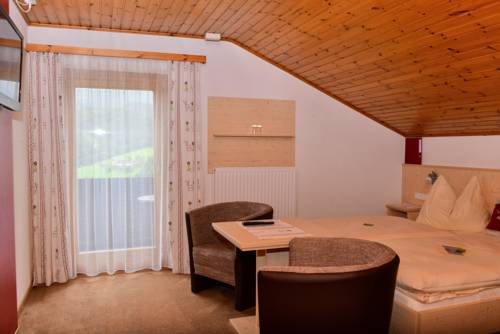 Imagen de la habitación del Hotel Sonnfeld. Foto 10