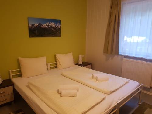 Imagen de la habitación del Hotel Sportland & Outdoor-center. Foto 7