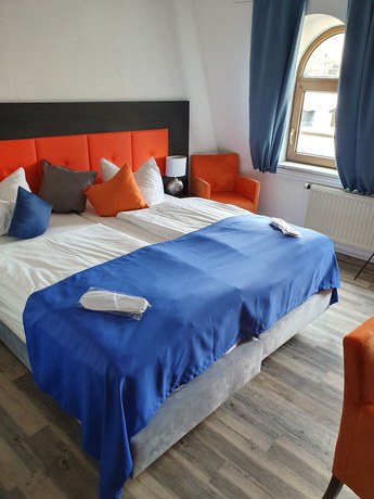 Imagen de la habitación del Hotel Stadt Milin. Foto 11