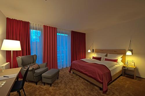 Imagen de la habitación del Hotel Stadtpalais. Foto 7