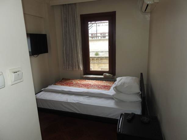 Imagen de la habitación del Hotel Star. Foto 7