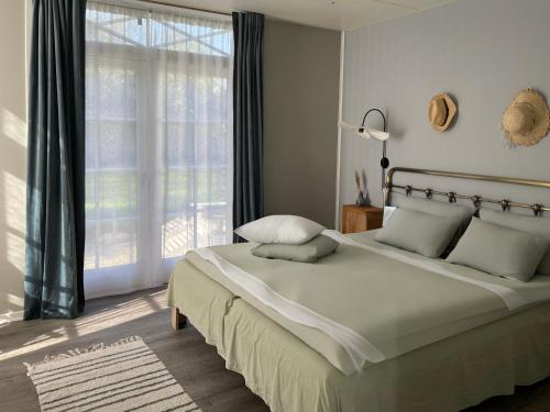 Imagen de la habitación del Hotel Strandgaarden. Foto 18
