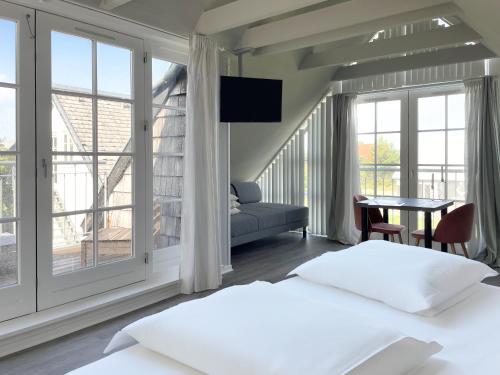 Imagen de la habitación del Hotel Strandgaarden. Foto 19