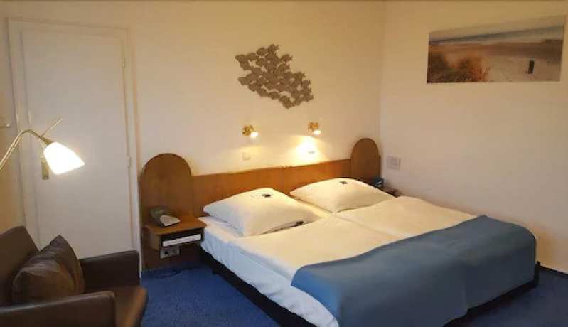 Imagen de la habitación del Hotel Strandhalle. Foto 10