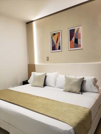 Imagen de la habitación del Hotel Suite Center. Foto 3