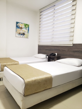 Imagen de la habitación del Hotel Suite Center. Foto 8