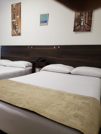 Imagen de la habitación del Hotel Suite Center. Foto 12