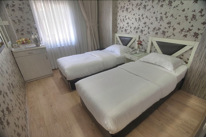 Imagen de la habitación del Hotel Sureyya. Foto 9