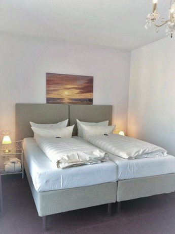 Imagen de la habitación del Hotel Sylter Blaumuschel. Foto 16