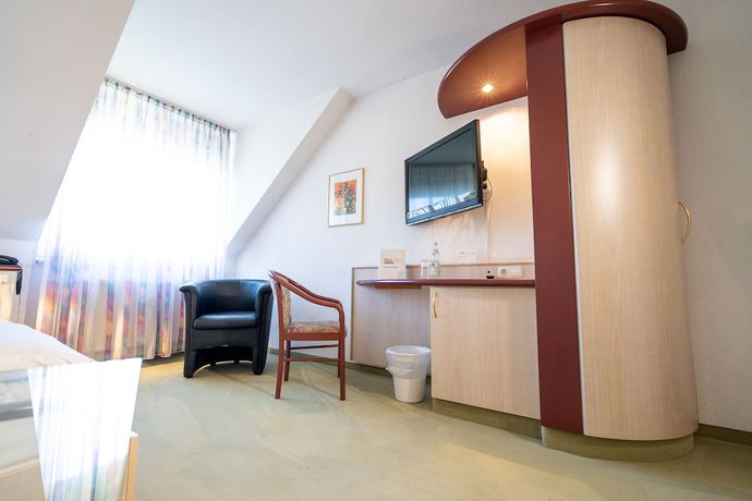 Imagen de la habitación del Hotel Tanne in Saalfeld. Foto 2