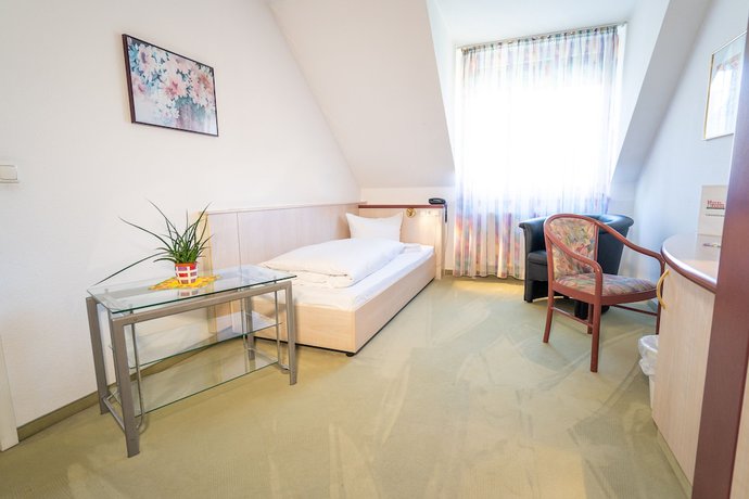 Imagen de la habitación del Hotel Tanne in Saalfeld. Foto 4