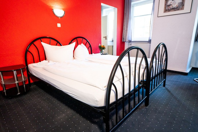 Imagen de la habitación del Hotel Tanne in Saalfeld. Foto 8
