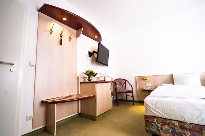 Imagen de la habitación del Hotel Tanne in Saalfeld. Foto 10
