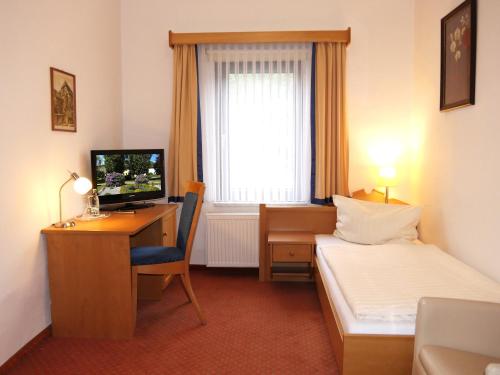 Imagen de la habitación del Hotel Thalfried. Foto 17