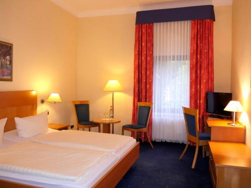 Imagen de la habitación del Hotel Thalfried. Foto 19