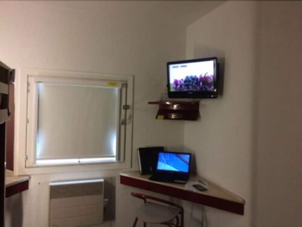 Imagen de la habitación del Hotel Thania. Foto 10