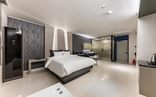 Imagen de la habitación del Hotel The Ocean. Foto 18