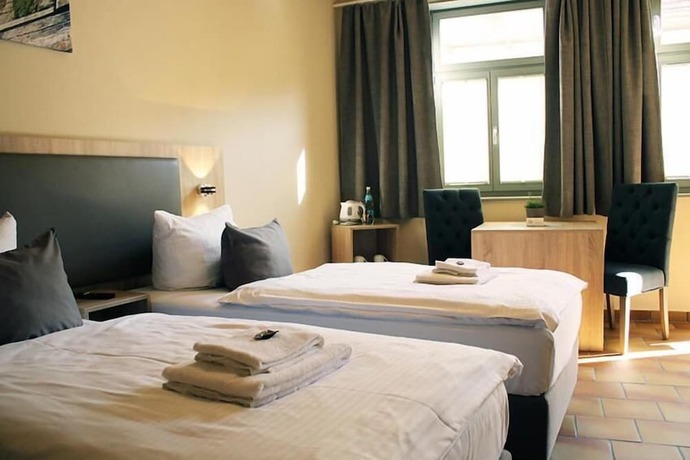 Imagen de la habitación del Hotel Tilia. Foto 11