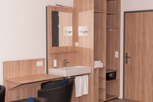 Imagen de la habitación del Hotel Traube Garni. Foto 16