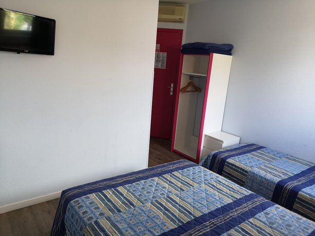 Imagen de la habitación del Hotel Triotel, La Valette du Var. Foto 8