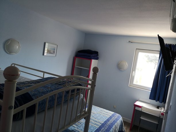 Imagen de la habitación del Hotel Triotel, La Valette du Var. Foto 11